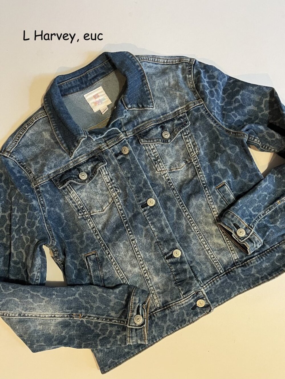 Large Lularoe Harvey jean jacket, blue animal print